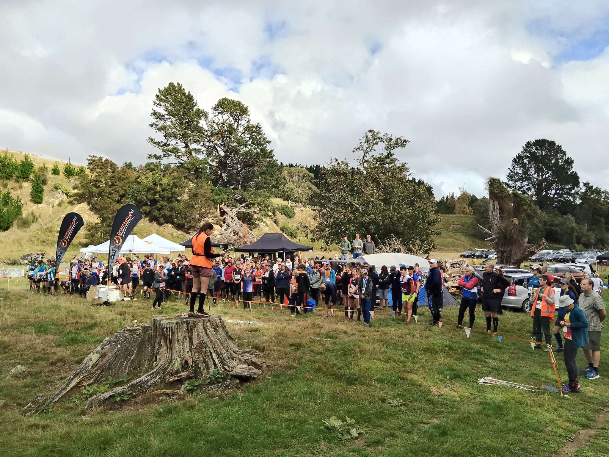 A large group of competitors gathered at an orienteering event