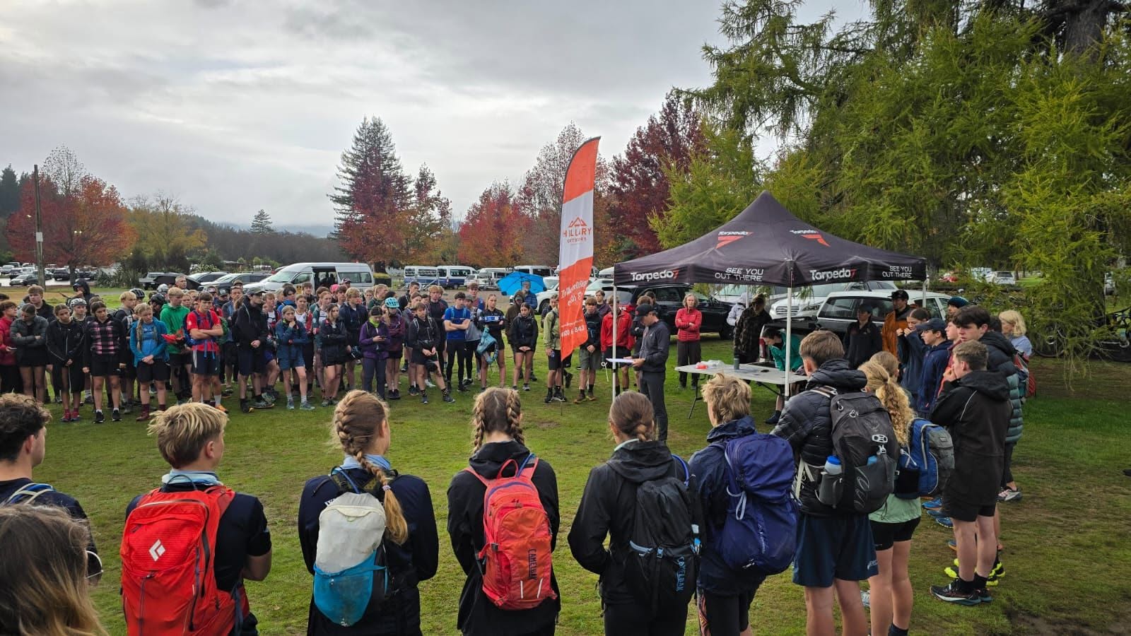 Competitors gathered for an event briefing