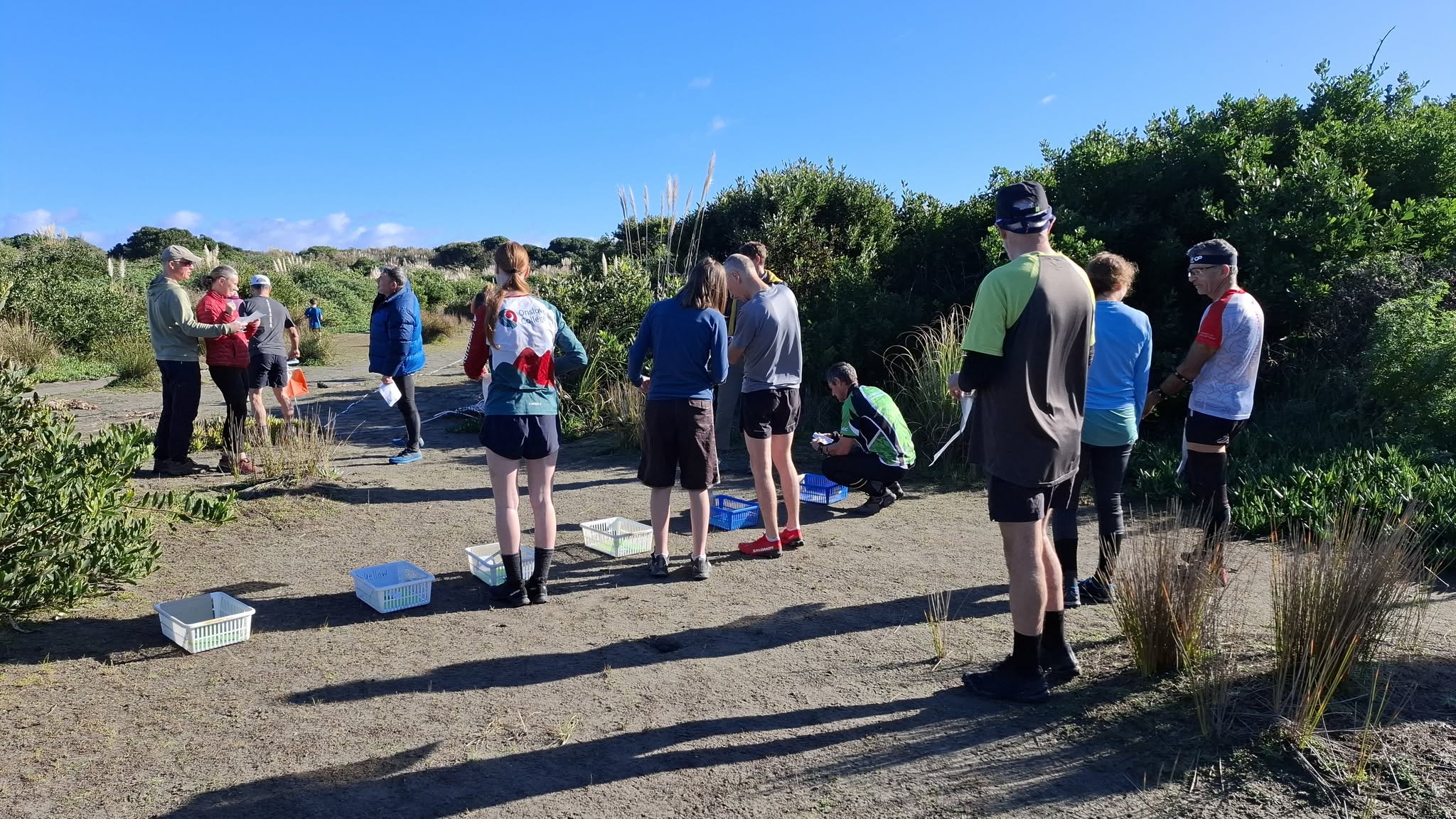 An orienteering start in open hill country